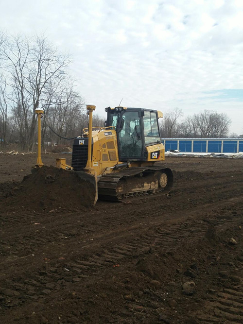 DE Excavating working on Concrete Dysert in Jackson Michigan